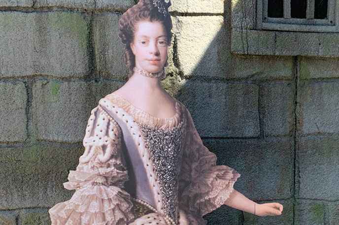 A cardboard cutout of Queen Charlotte is taking Charlotte Mecklenburg Library and Charlotte by storm.