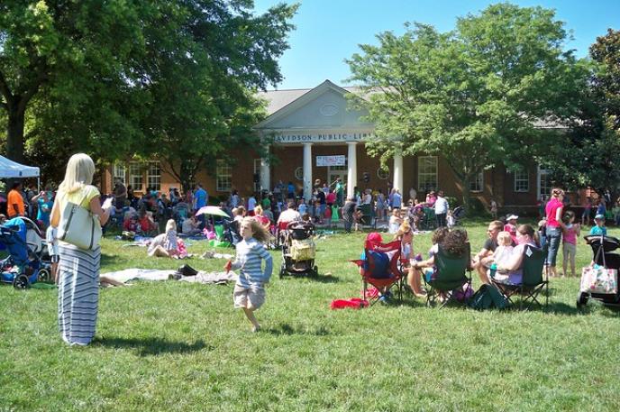 Charlotte Mecklenburg Library customers enjoy summer time at Davidson Library in Davidson, North Carolina