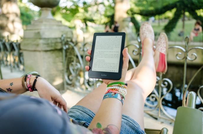 Person reading a mystery book. The Charlotte Mecklenburg Library provides mystery booklist suggestions for mystery readers. Person reading a mystery ebook. The Charlotte Mecklenburg Library provides mystery booklist suggestions for mystery readers.