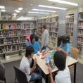 Asian American students participating in a Library event. 