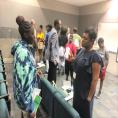 A Charlotte Mecklenburg student engages in conversation with a careerwoman during the Library's "Bigger than High School" event in July, 2019. 