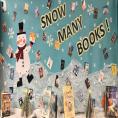 A holiday book display that reads "snow many books" at  Charlotte Mecklenburg Library's Mint Hill Library.