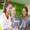 Women looking at Library resources on a tablet